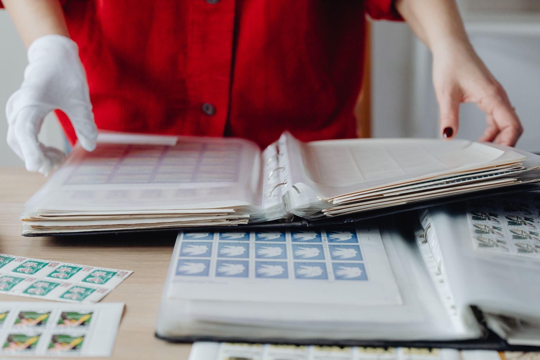 An online course creator sorting research notes into two piles