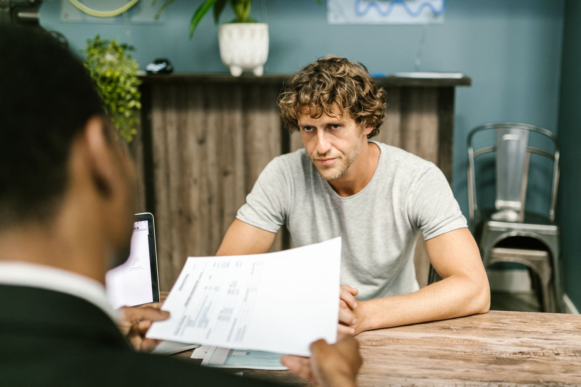 A consultant reviewing a completed project with a client