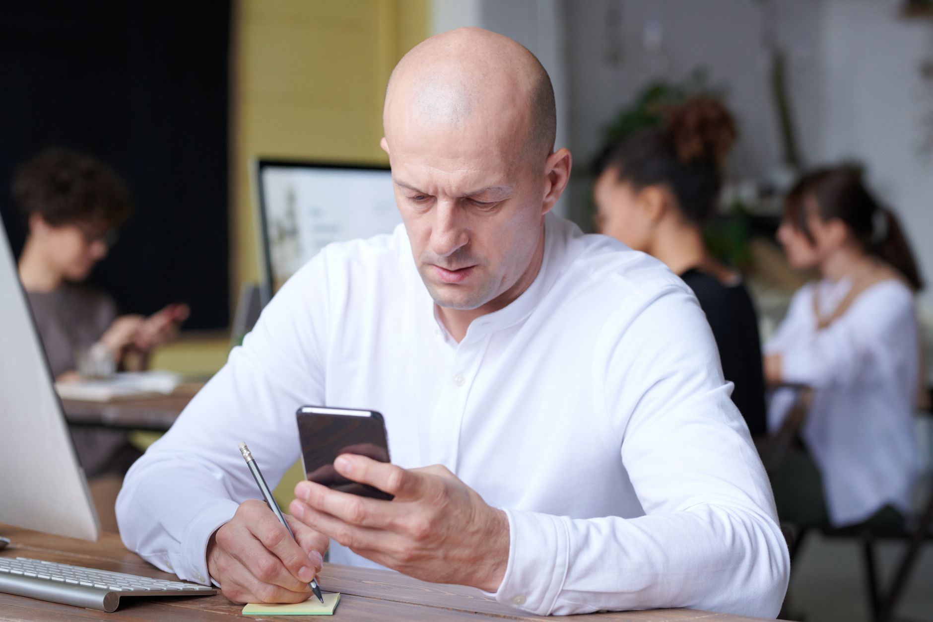 A business owner checking recent reviews and enquiries
