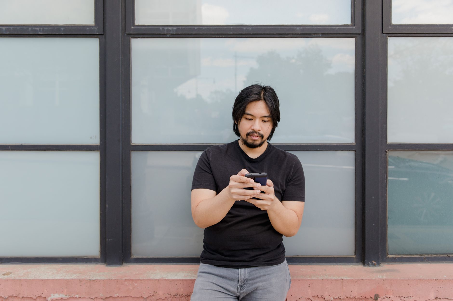 A visitor waiting for a slow page to load on their phone