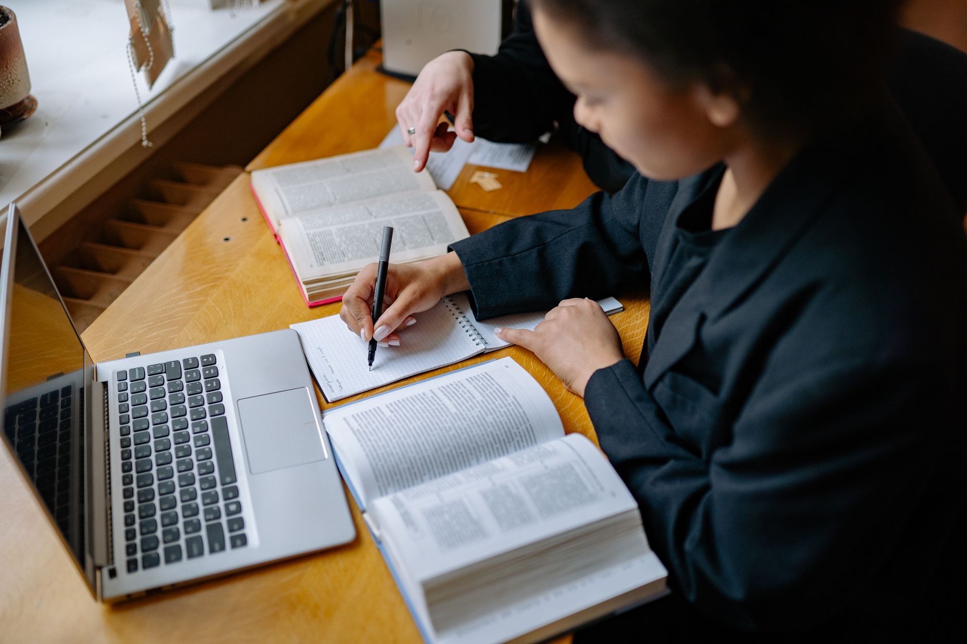 A tutor writing a helpful guide for parents and students