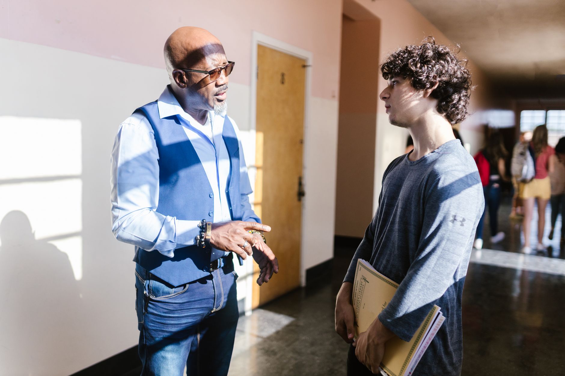 A tutor building a relationship with a local school