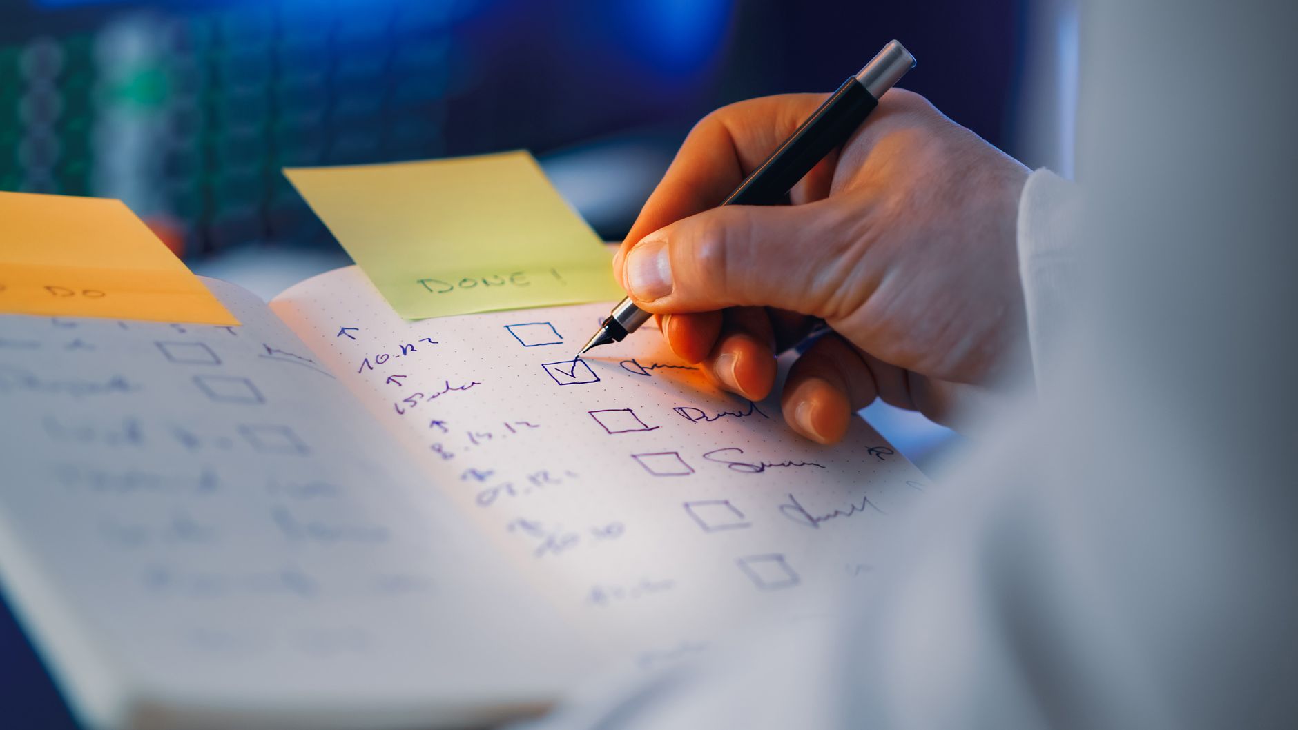 A shopkeeper checking that their business details are accurate and consistent