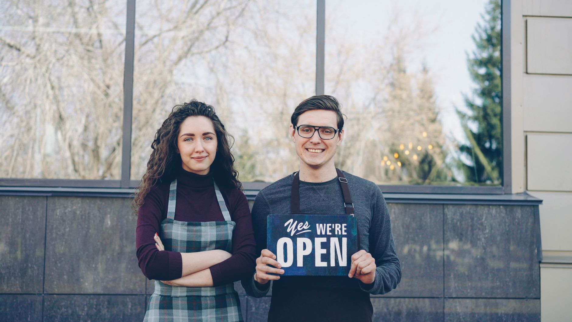A small business marking a milestone anniversary outside their premises