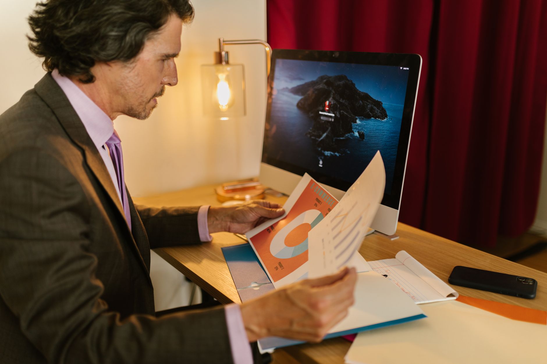 An owner going through UK business statistics at home
