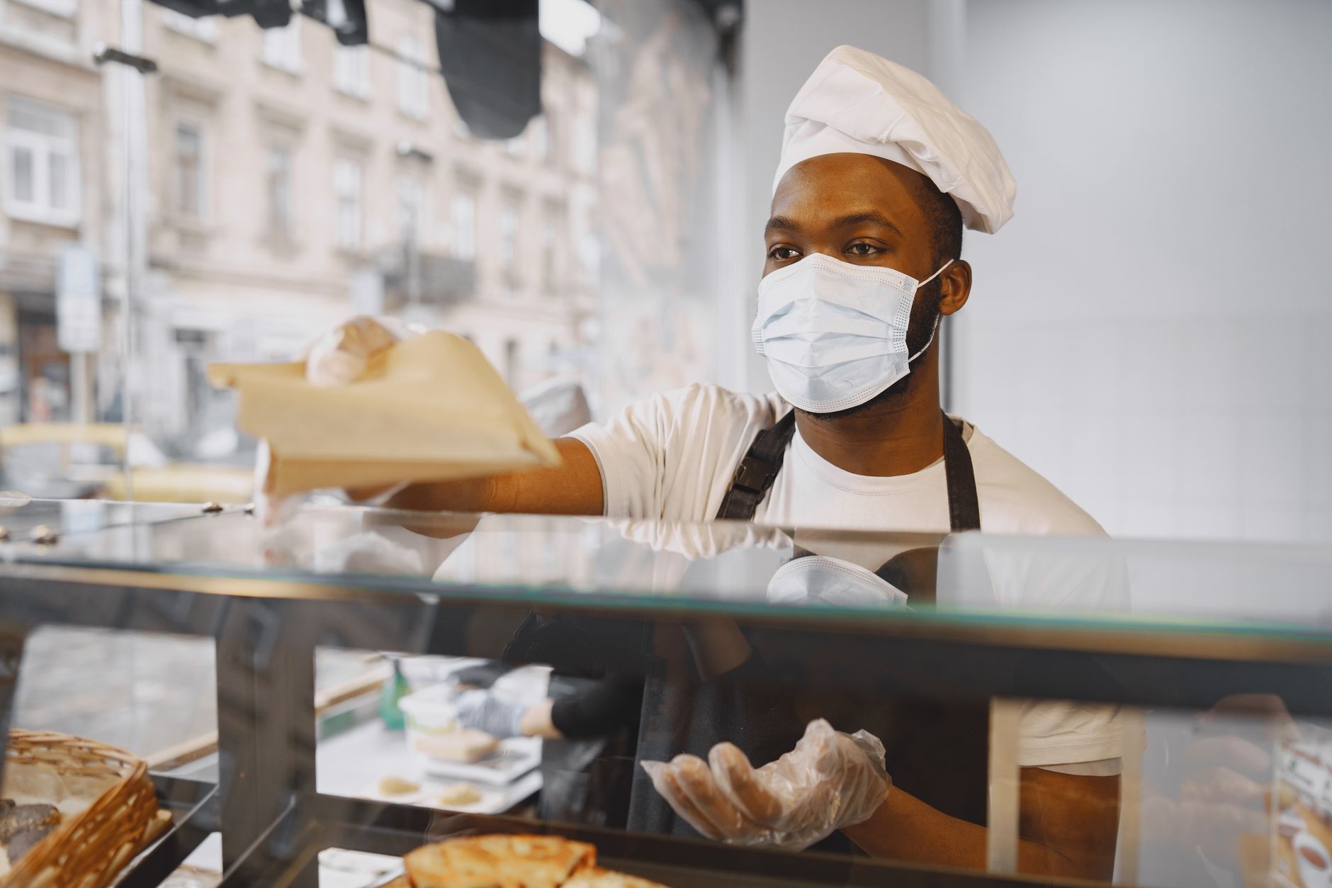A baker preparing her new shop for opening week