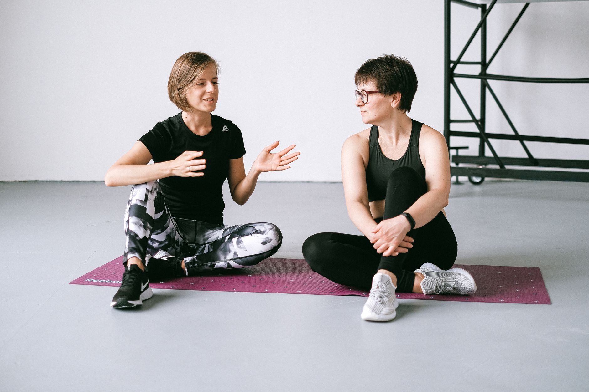 A gym owner and trainer planning the year's classes and offers