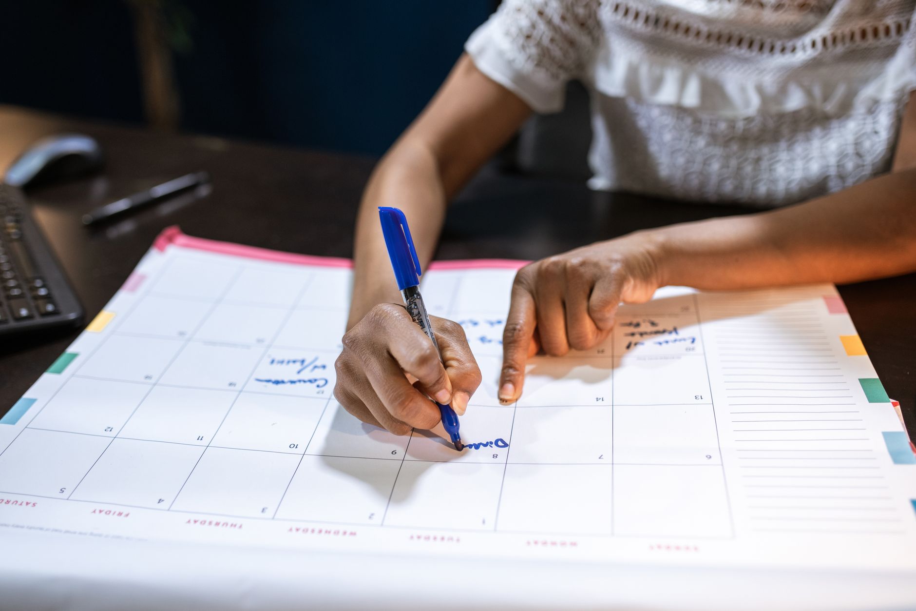 An owner checking the past month against the marketing calendar