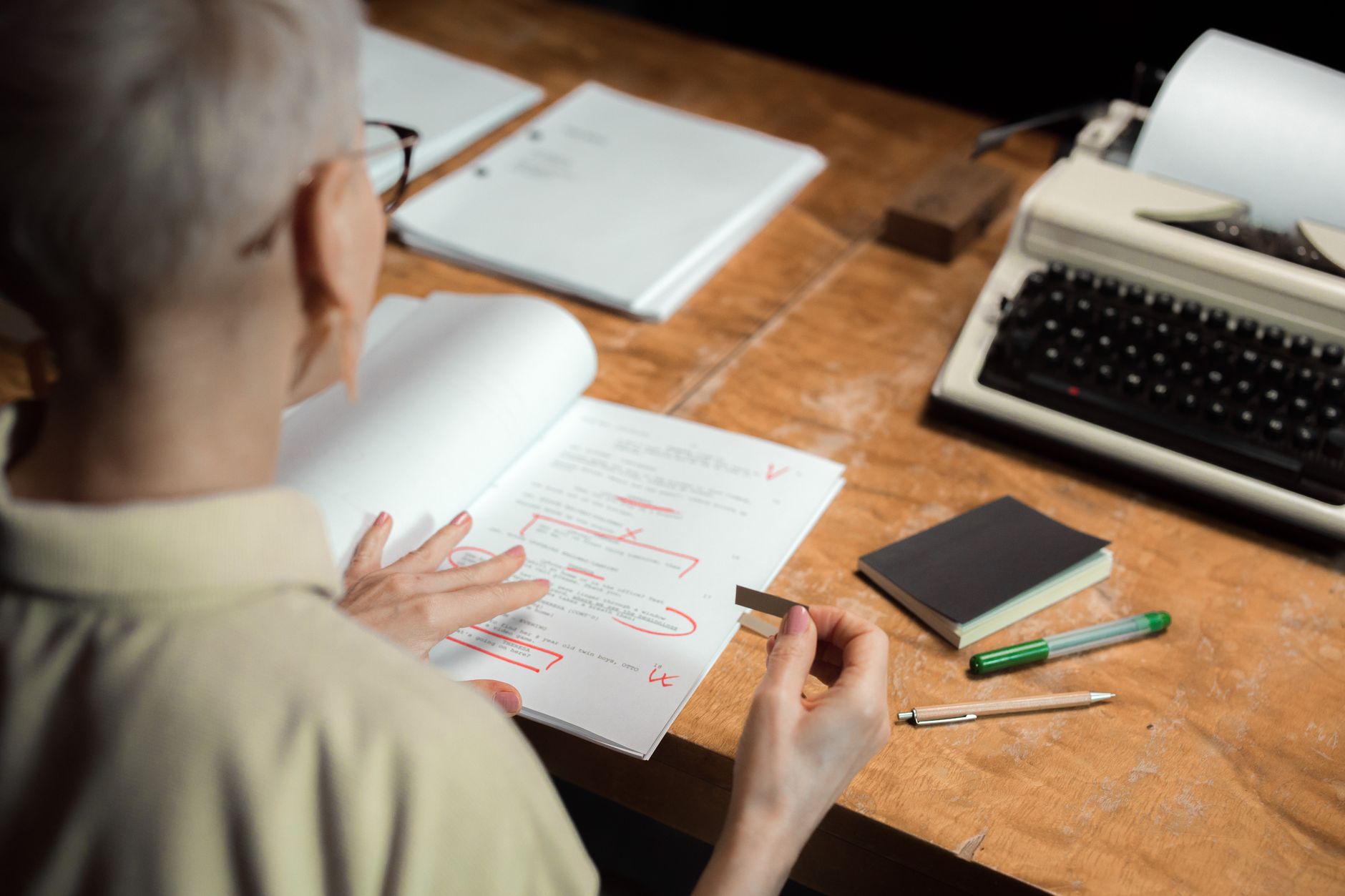 An author reviewing cover concepts and brand notes