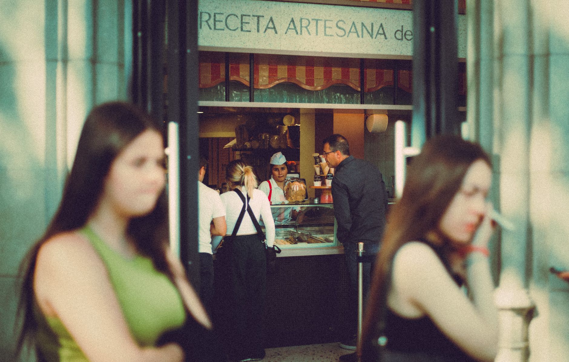 Customers queuing outside an independent bakery in the morning