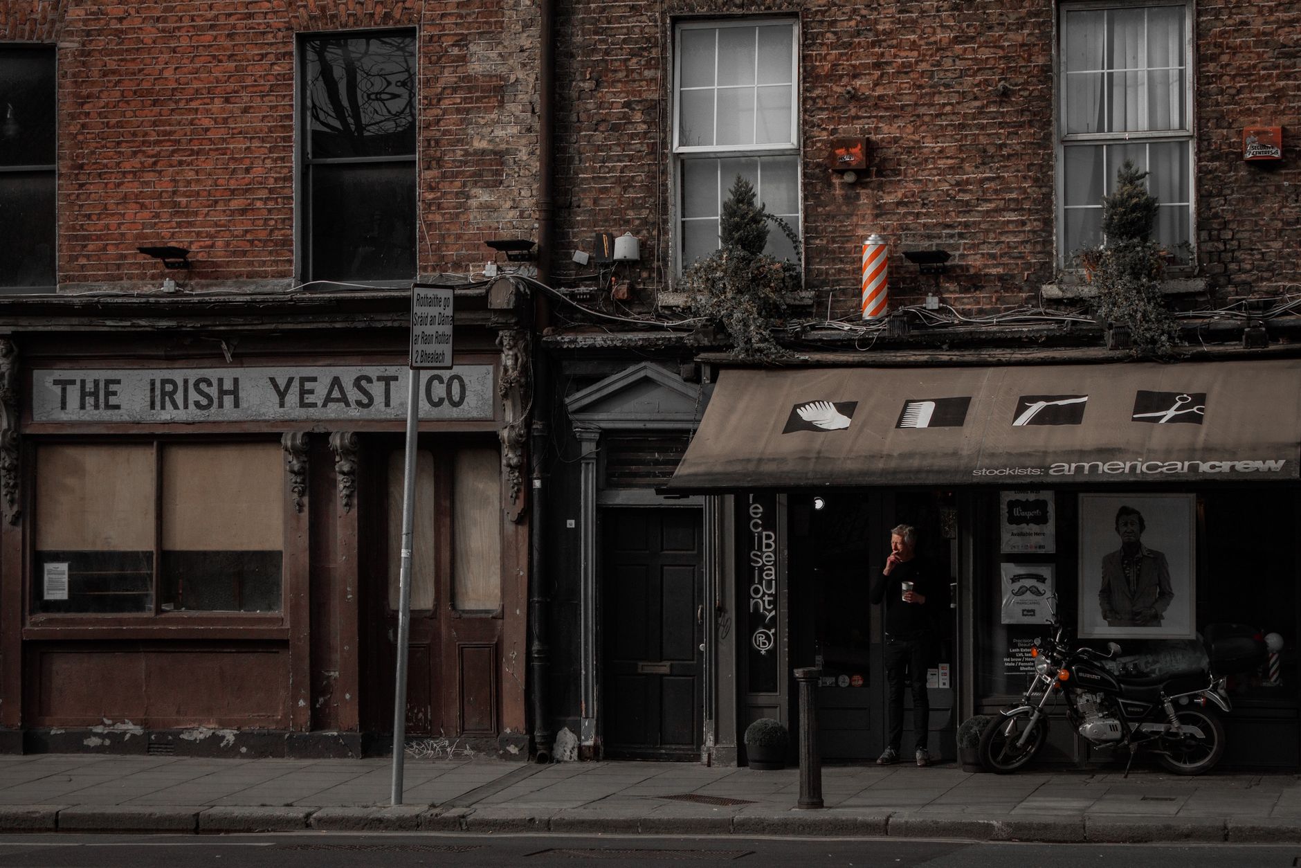 A barbershop with a clear, consistent shopfront on a high street