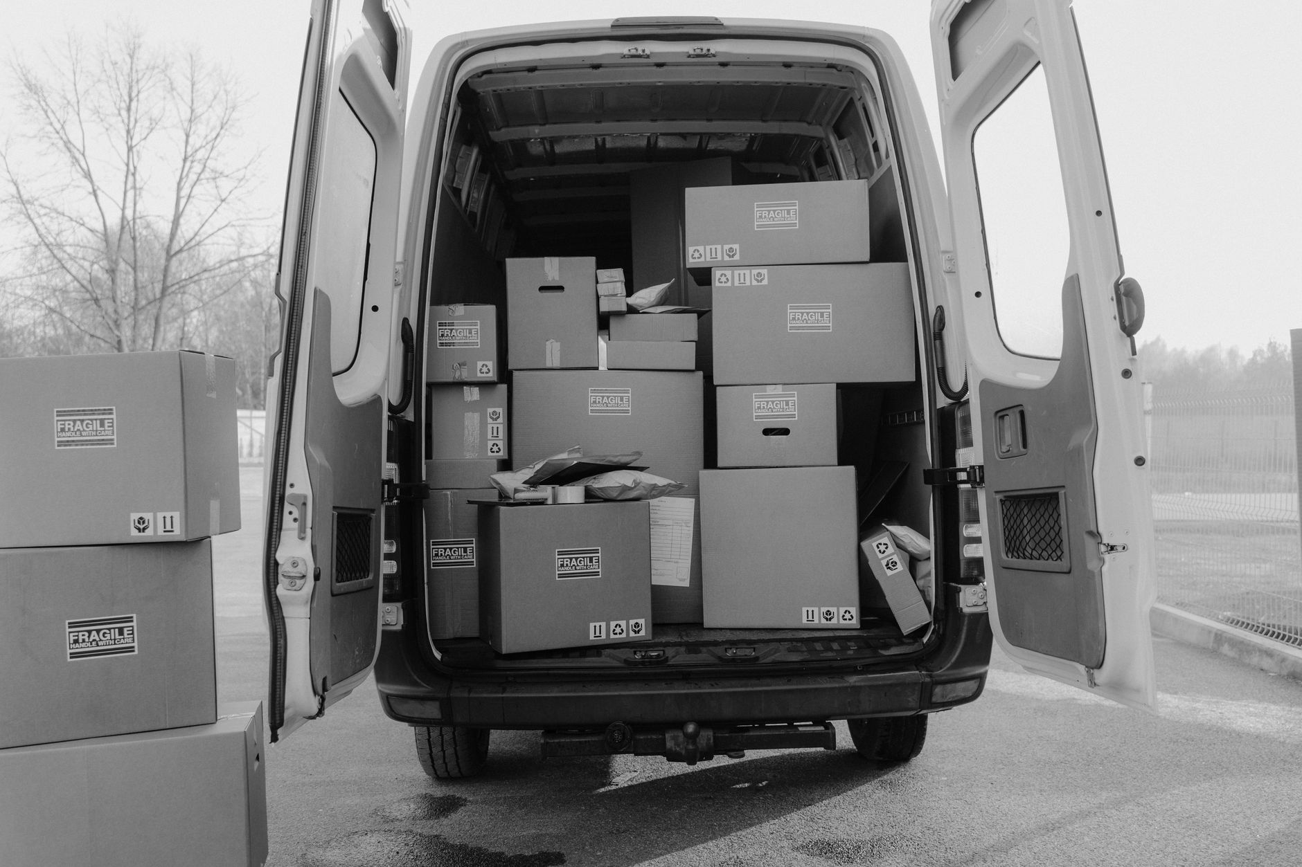 A catering team unloading food crates for a workplace event