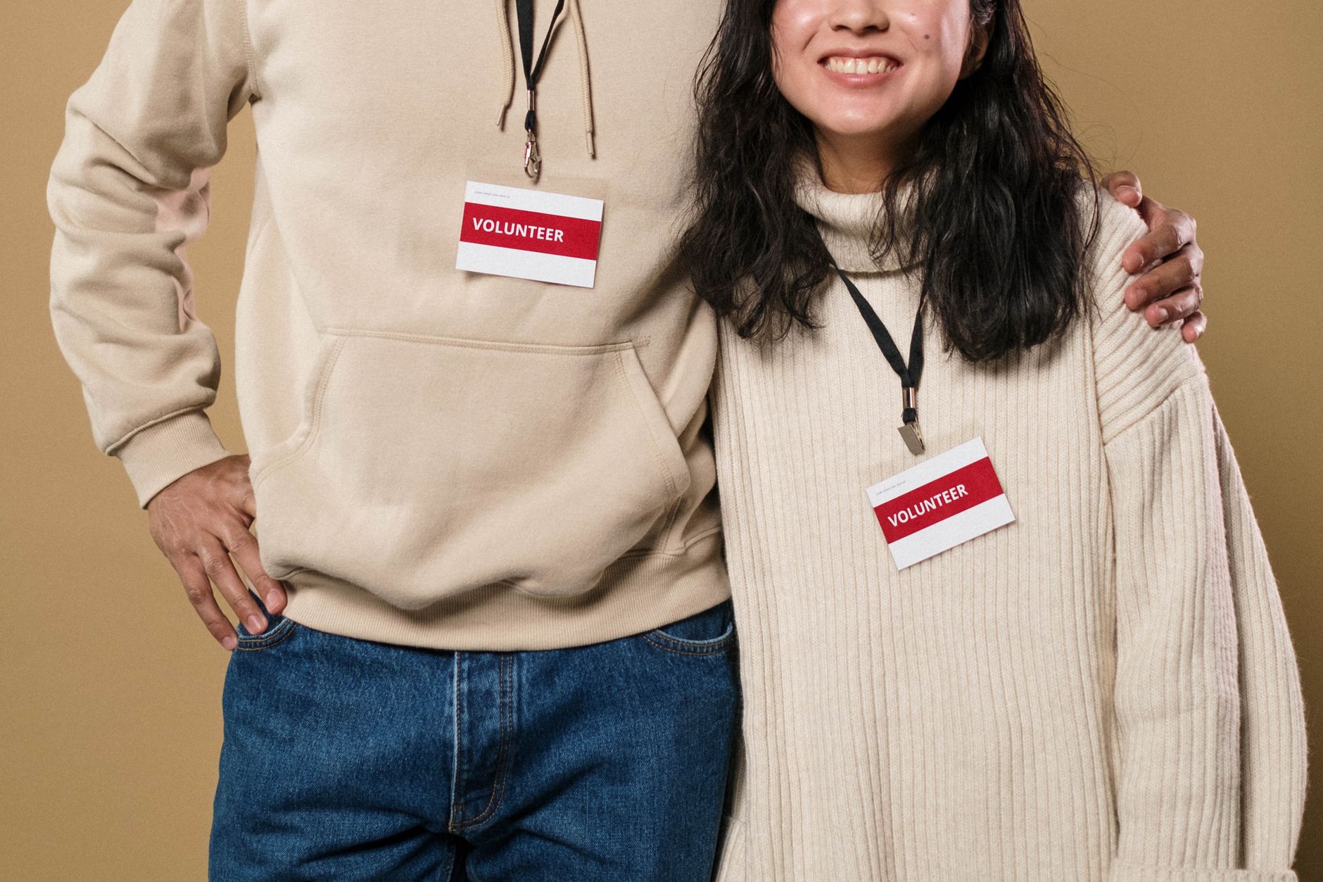 A volunteer coordinator welcoming a new volunteer warmly