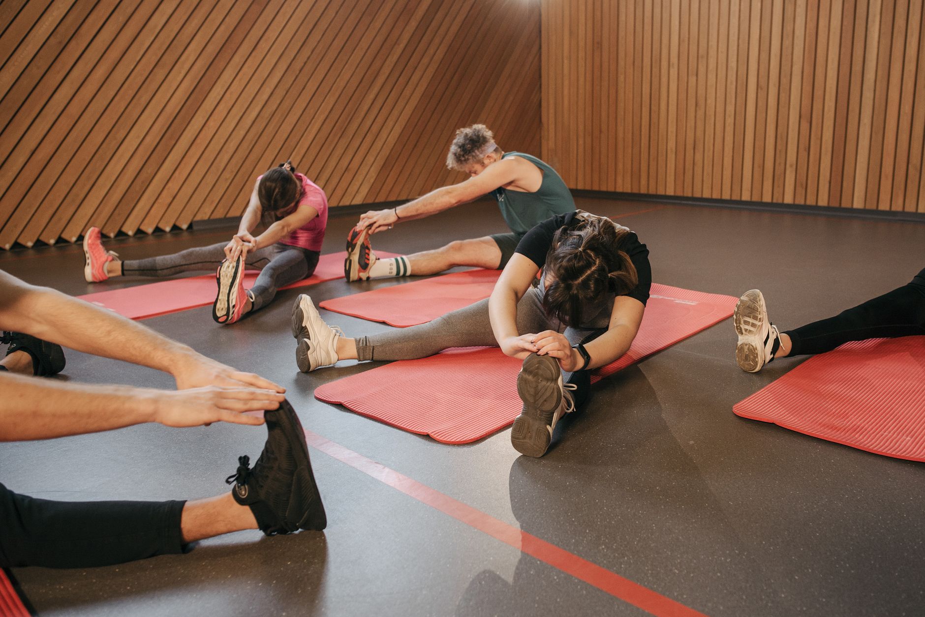Members taking part in a group fitness class at a local gym