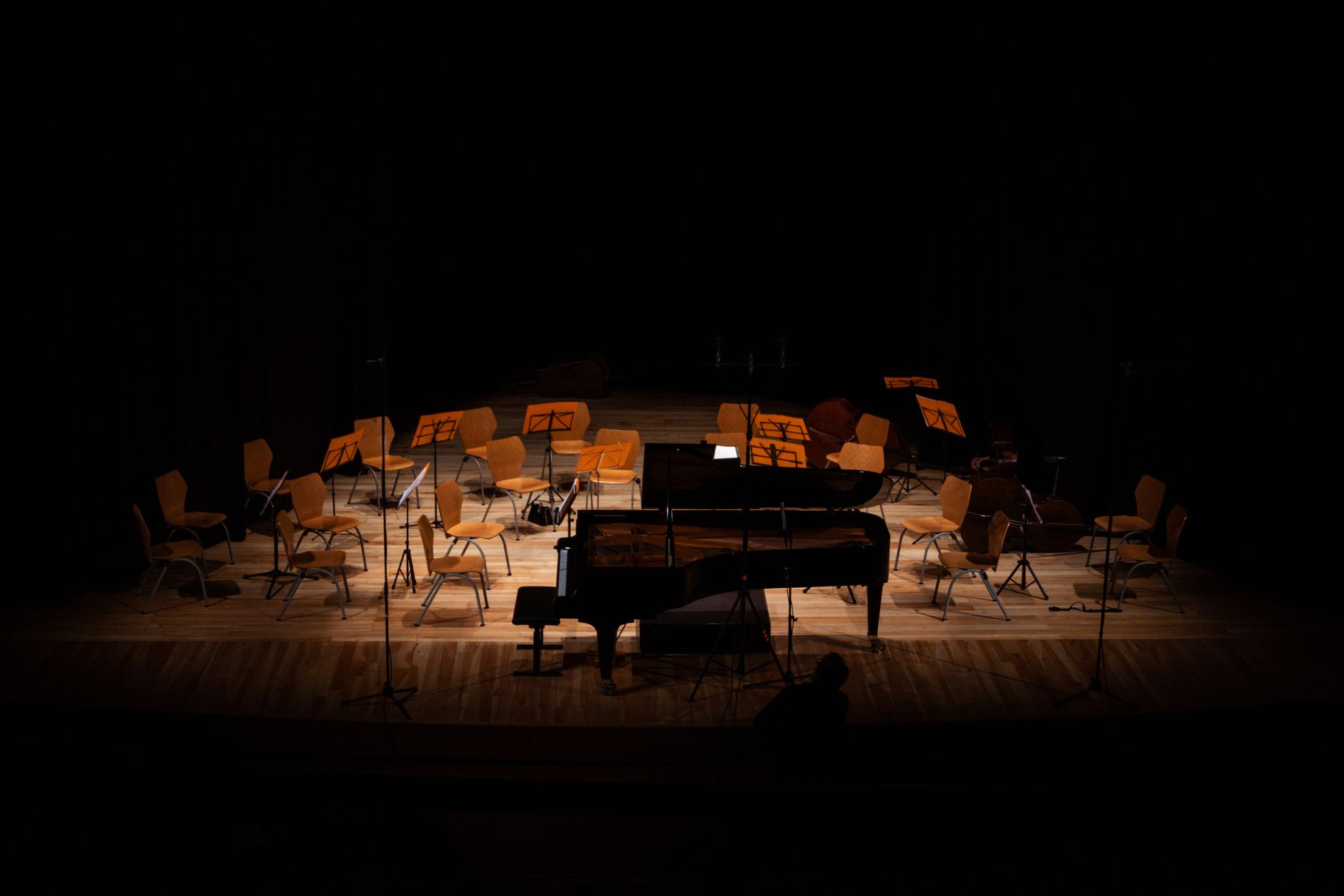 An empty school music room with instrument cases stored away