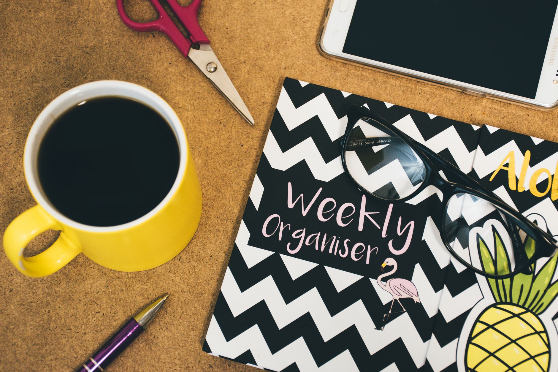 A nail technician planning her weekly marketing routine