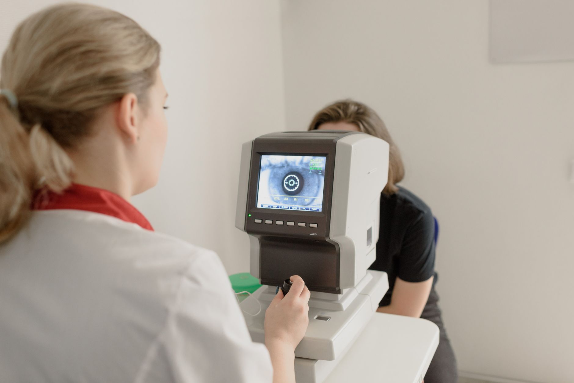 An elderly patient undergoing a routine eye test