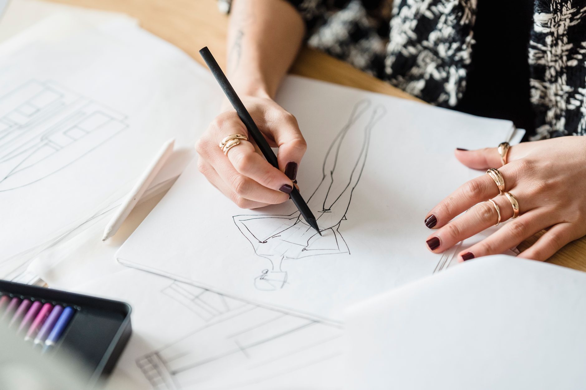 An illustrator working on the style they are known for