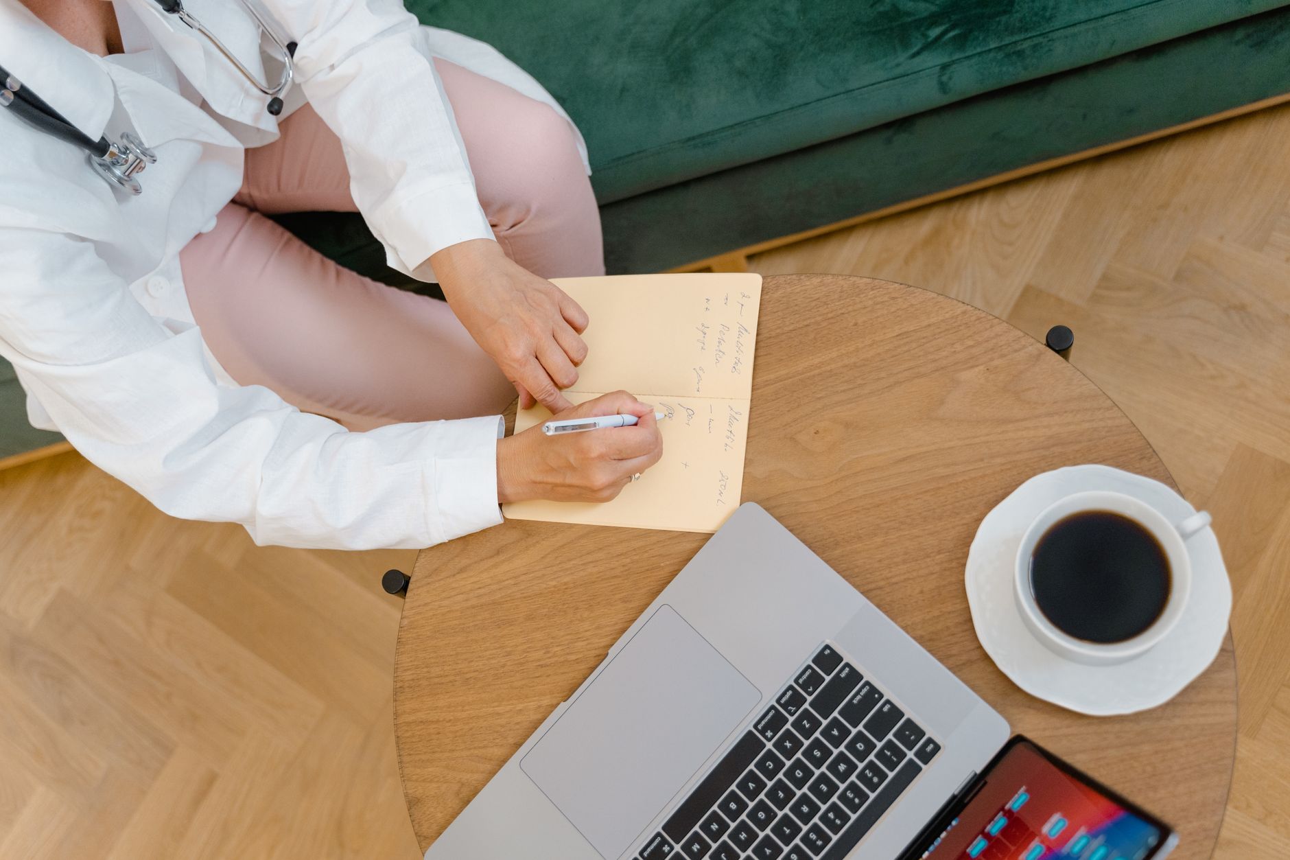 A clinic owner writing out a simple marketing plan