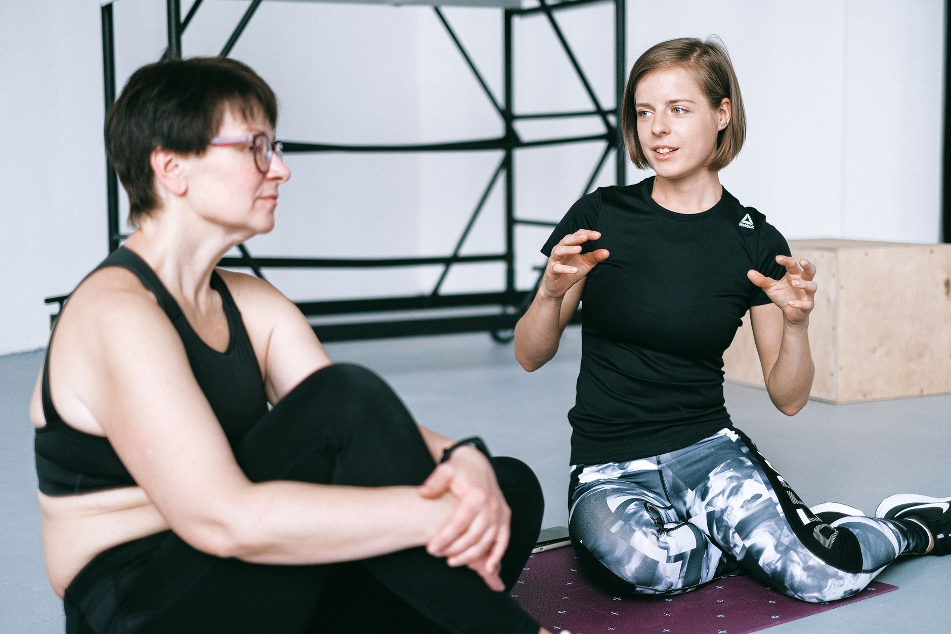 A physiotherapist discussing a referral with a local GP