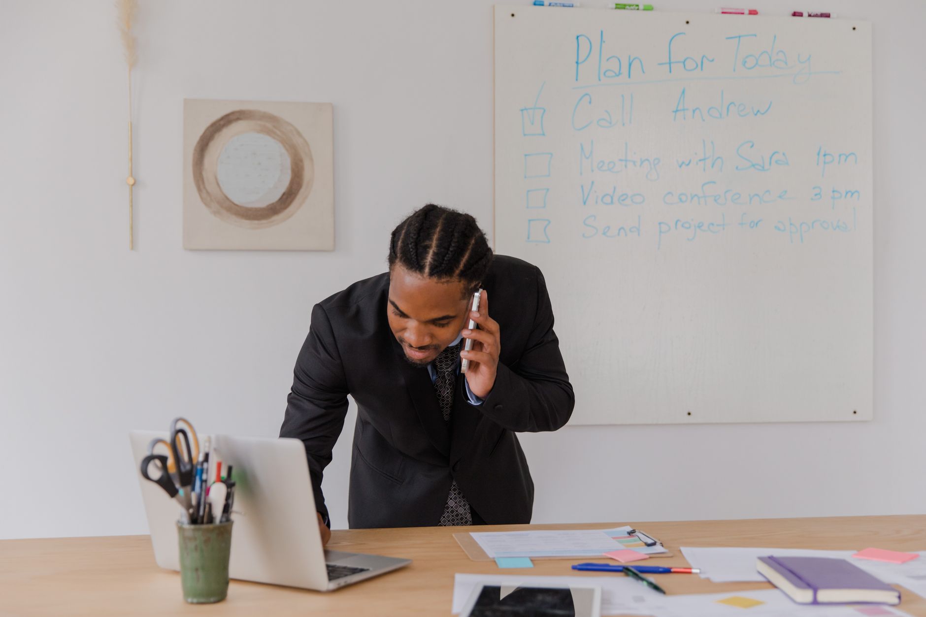An owner reviewing their weekly marketing tasks behind the counter