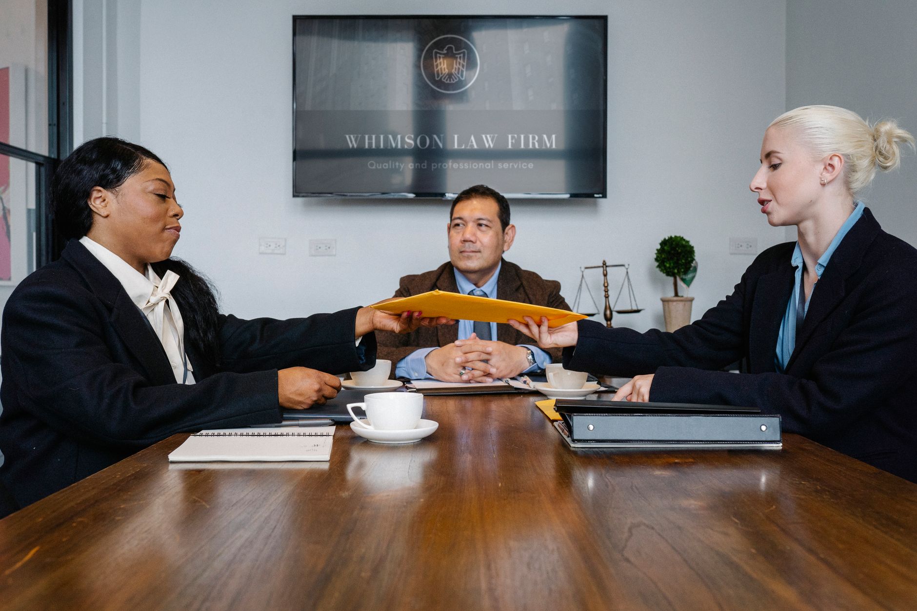Two law firm partners planning their marketing approach together
