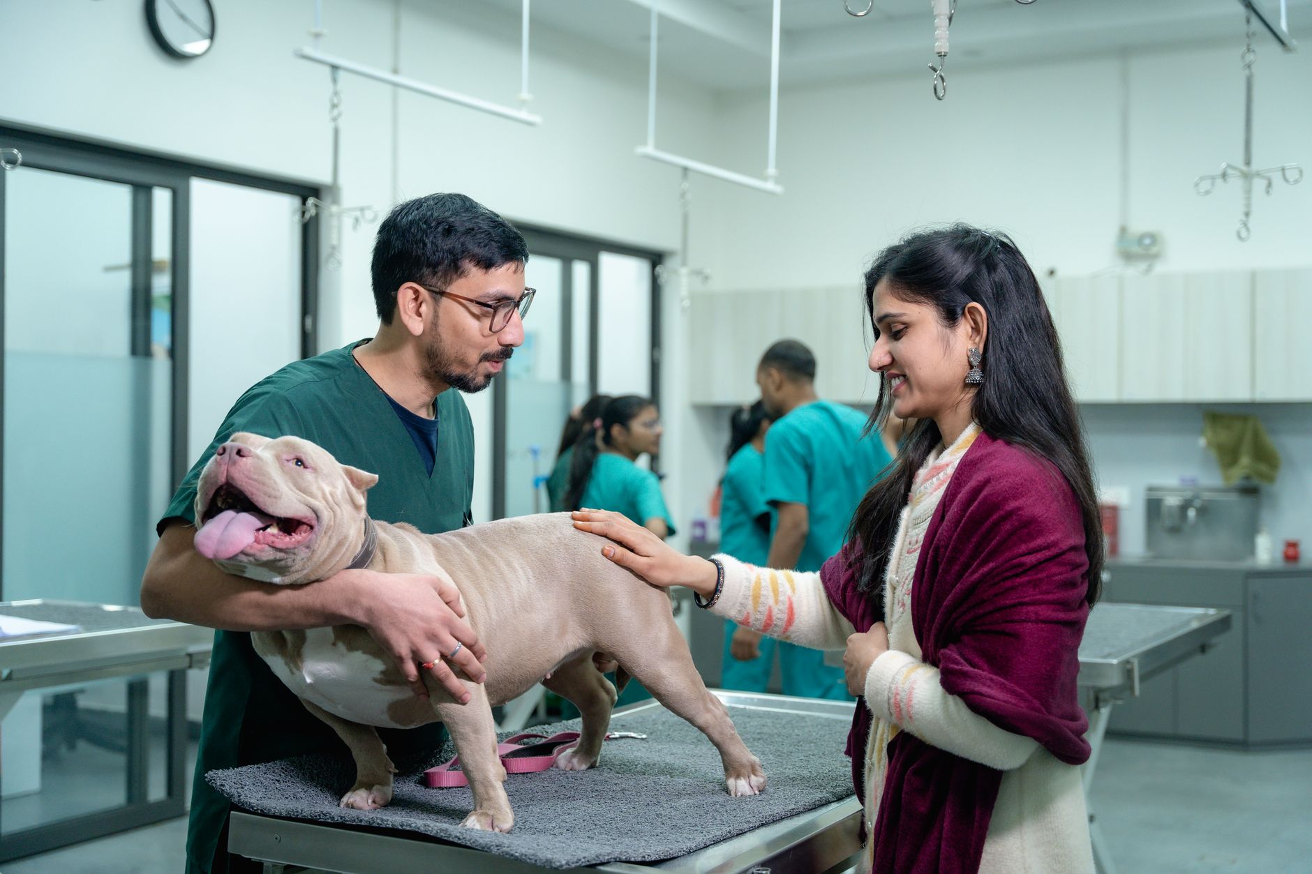 A relieved owner reunited with their recovered dog