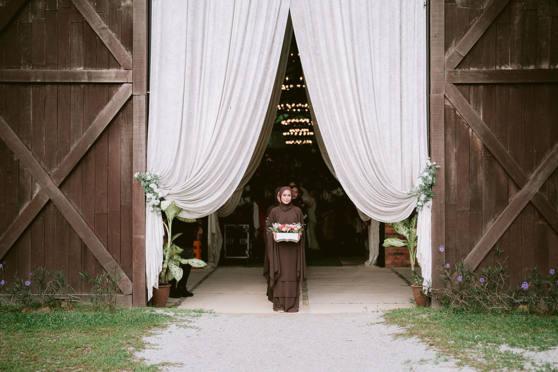 A wedding venue owner checking the room before guests arrive
