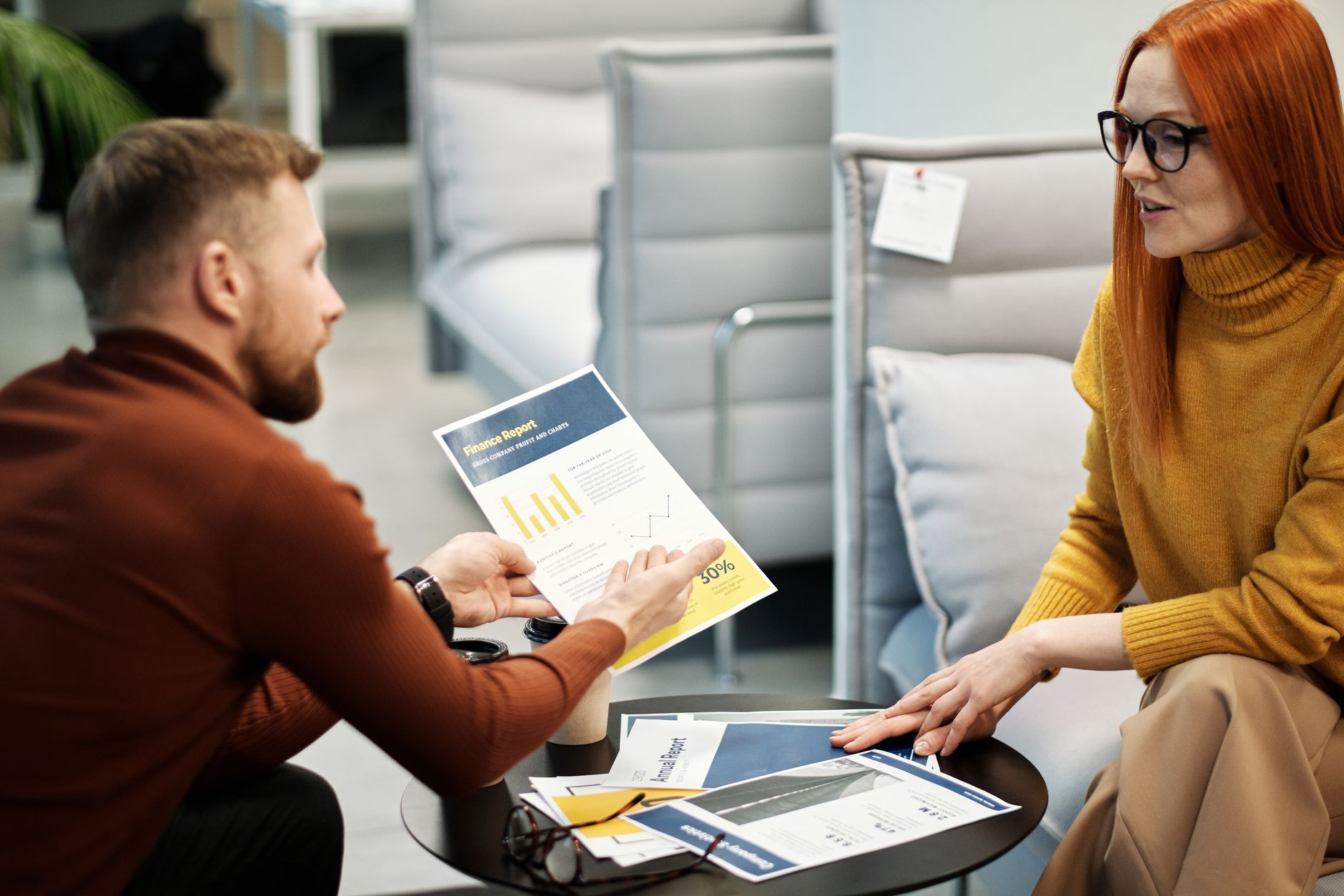 Two colleagues discussing how their pricing and promotion fit together