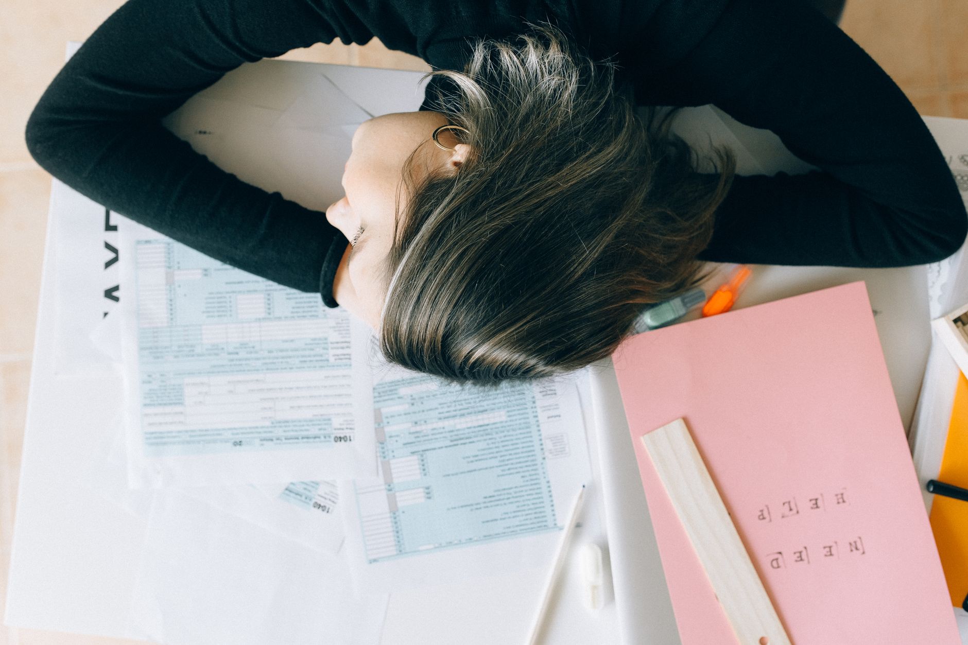 A stretched small business owner facing too many tasks at once