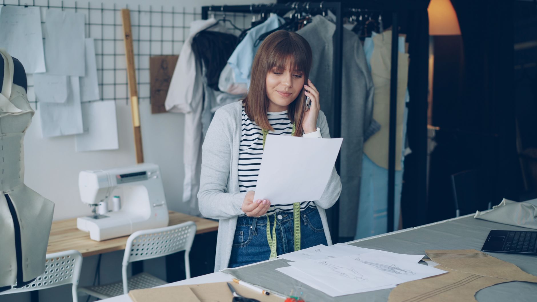 A stretched small business owner juggling several jobs at once