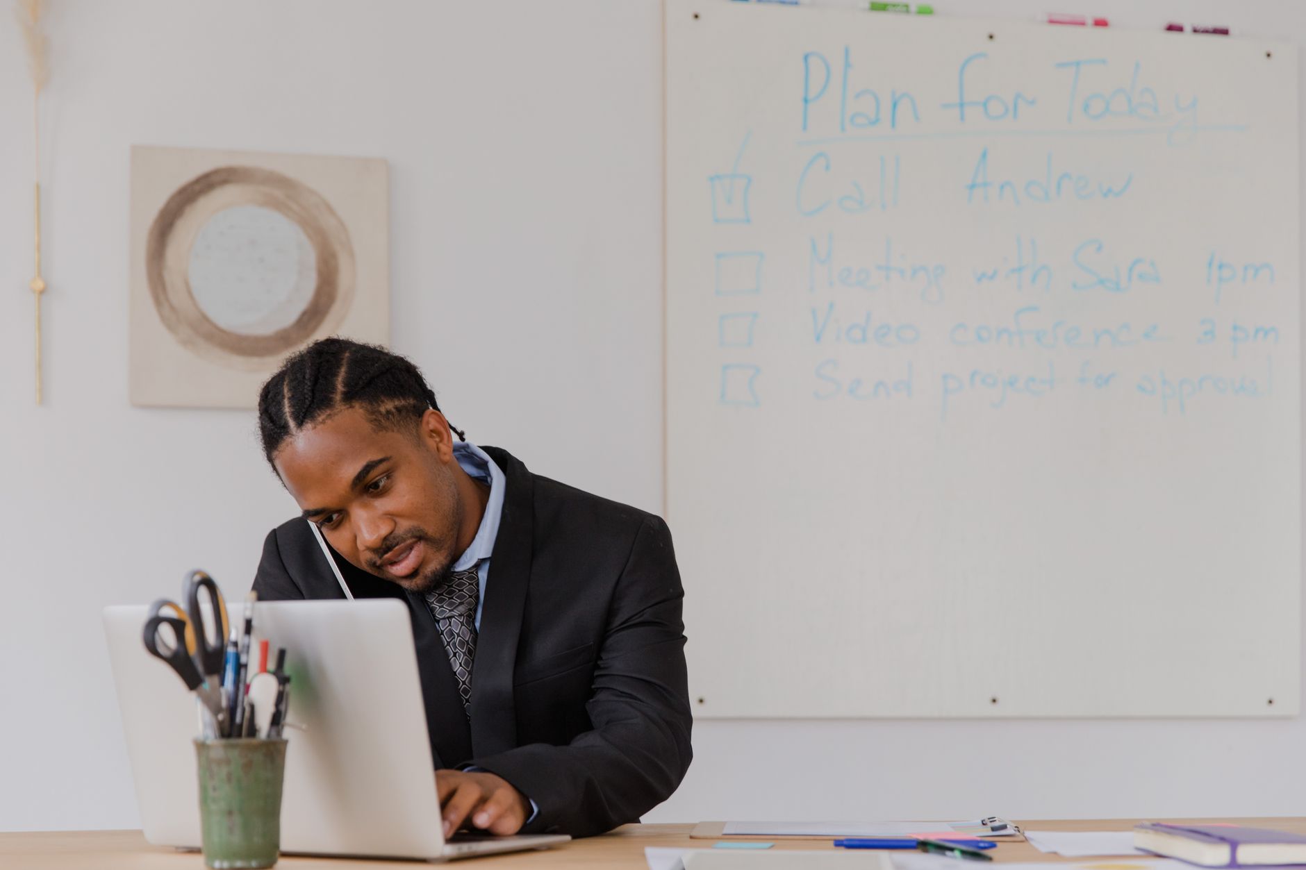 A business owner checking a draft before it goes out under their name