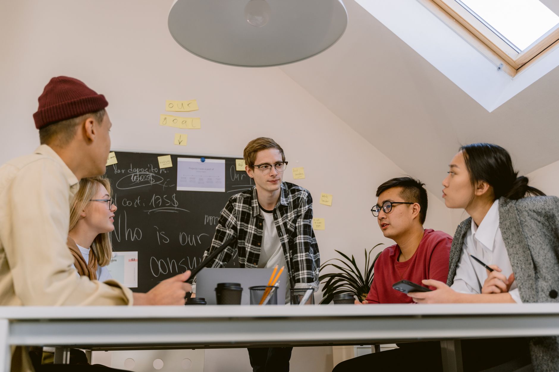 A small software team discussing how to position their product