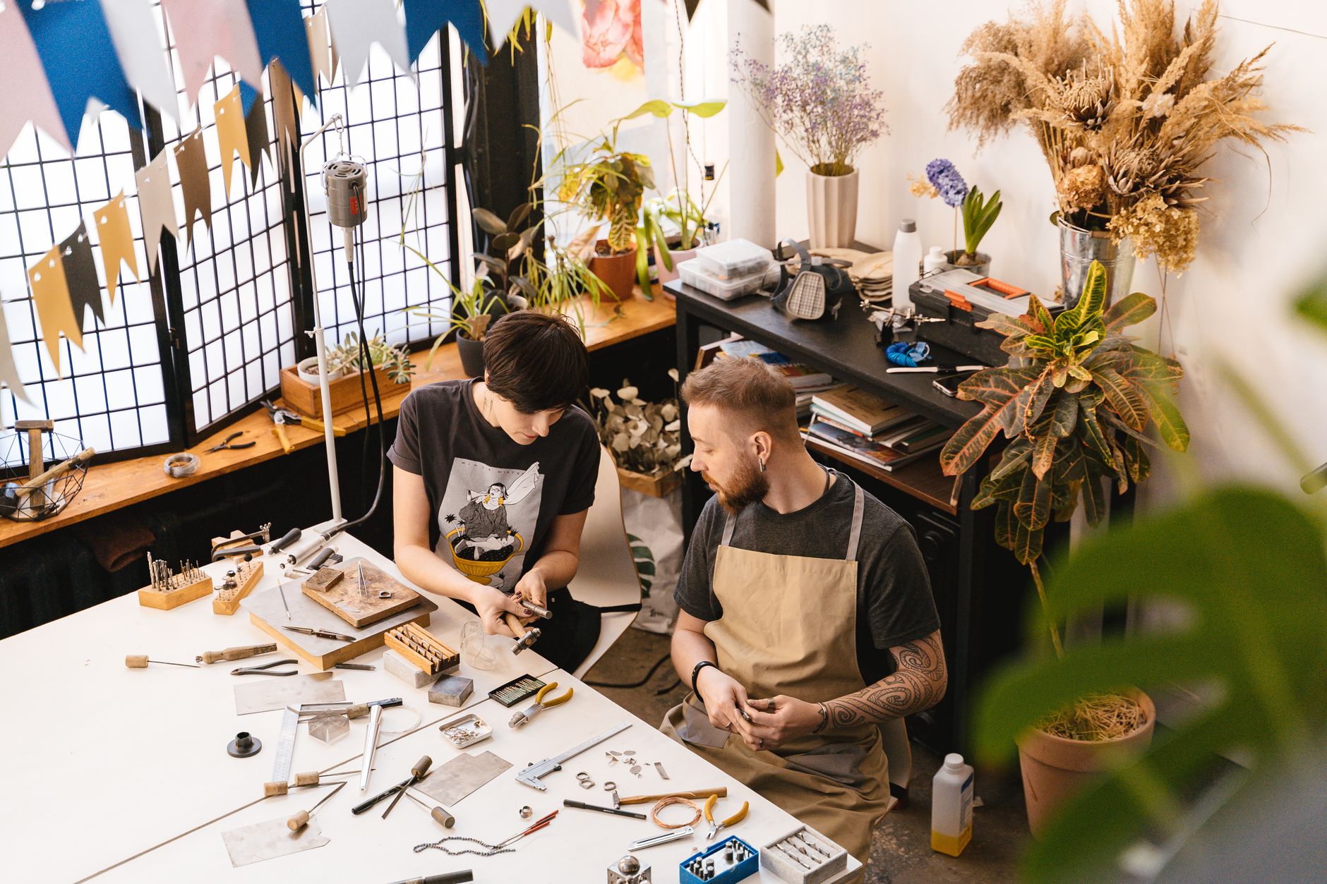 A maker preparing a handmade product for an online listing