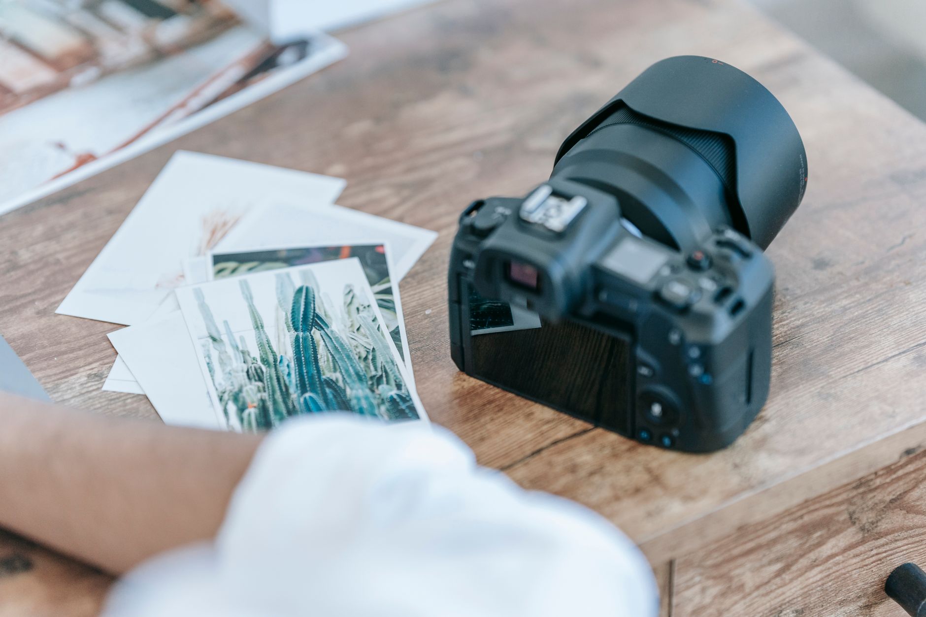 A seller arranging a set of product photos in order for a listing