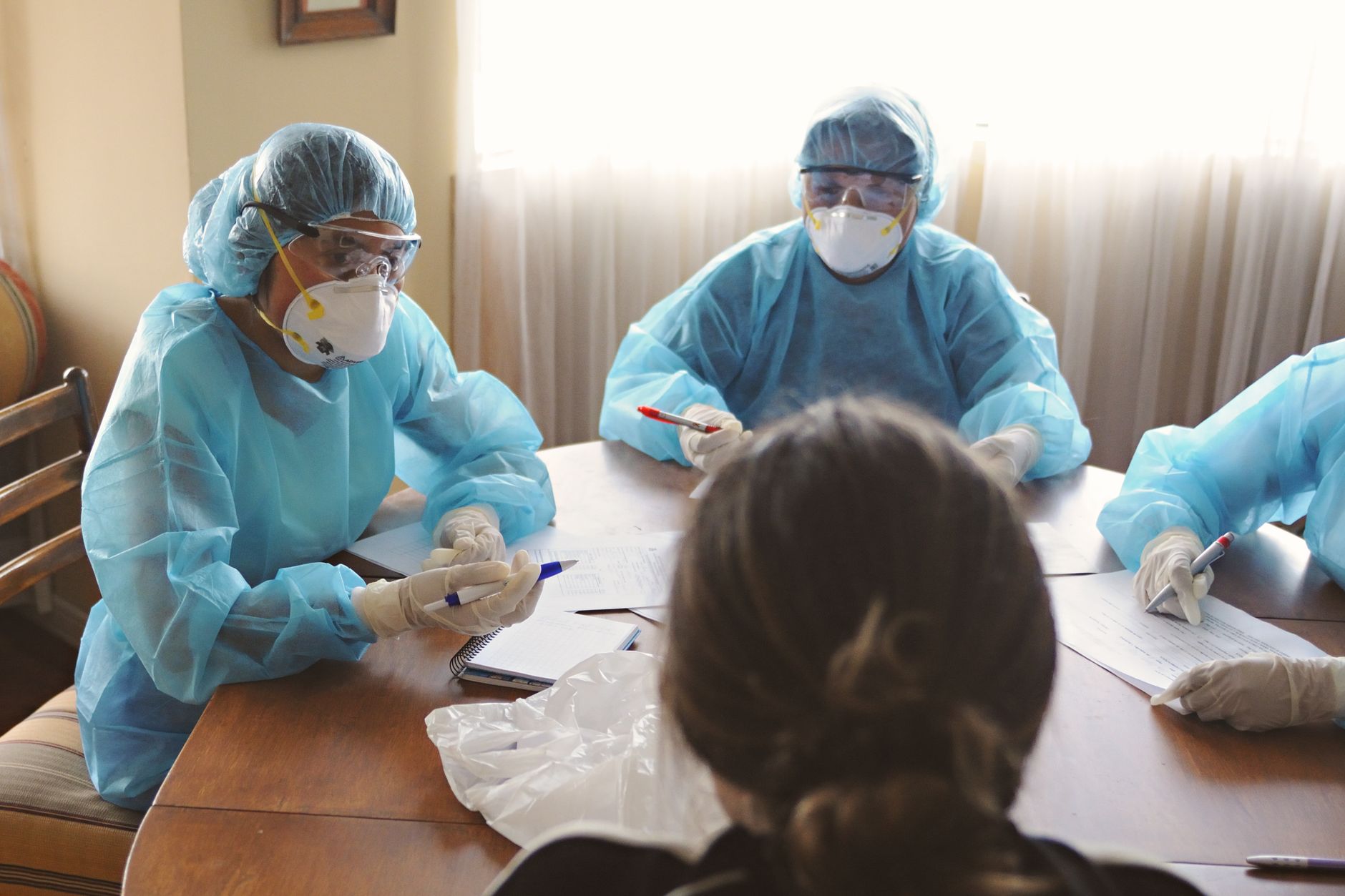 Clinic staff being briefed together ahead of a rebrand announcement