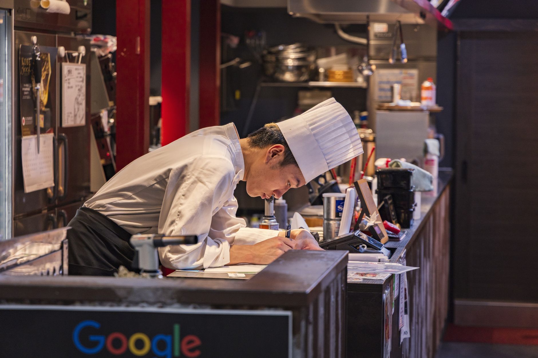 A restaurant owner writing an update for regular customers