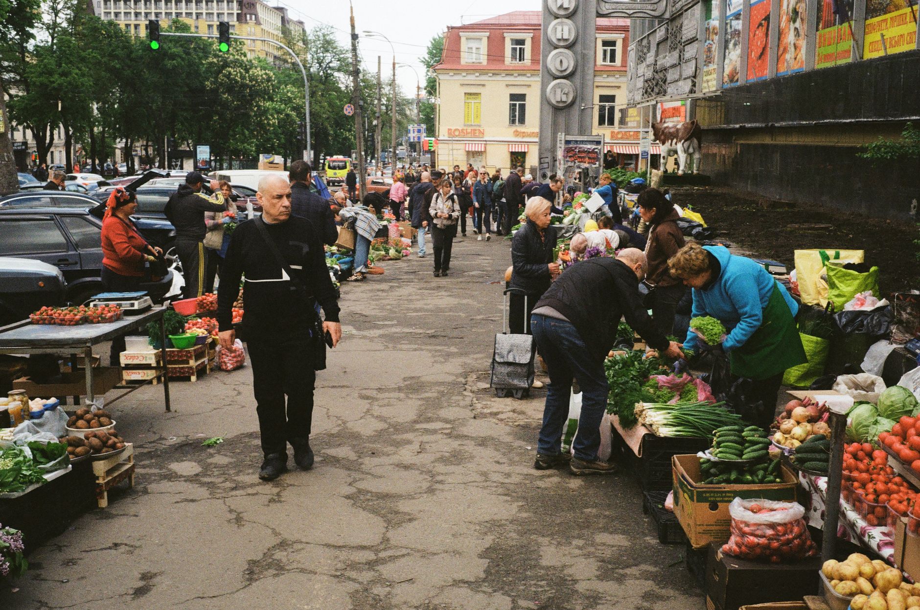 A distinctive market stall drawing more attention than a generic one nearby