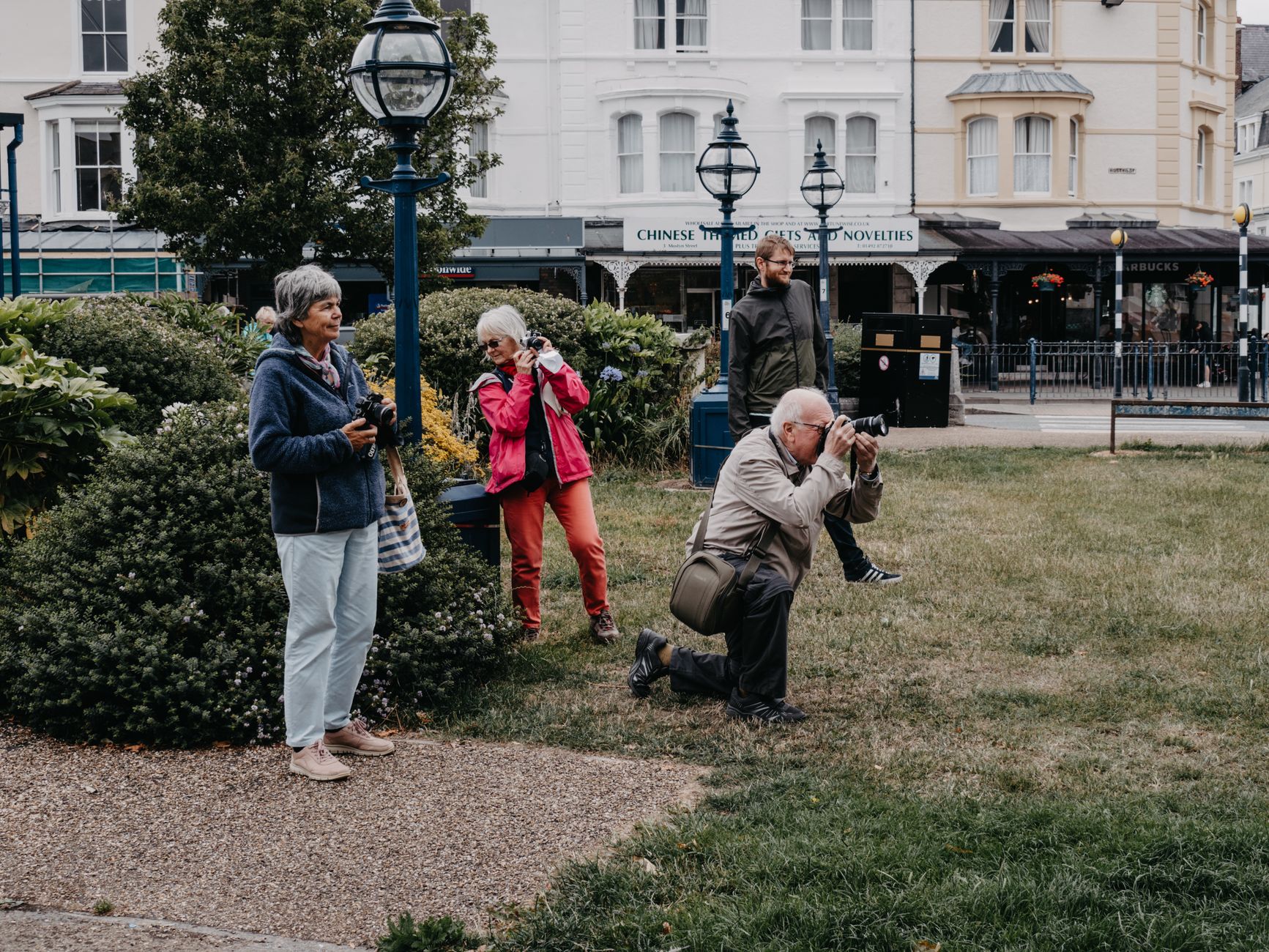 A photographer capturing a real moment outdoors in the cold