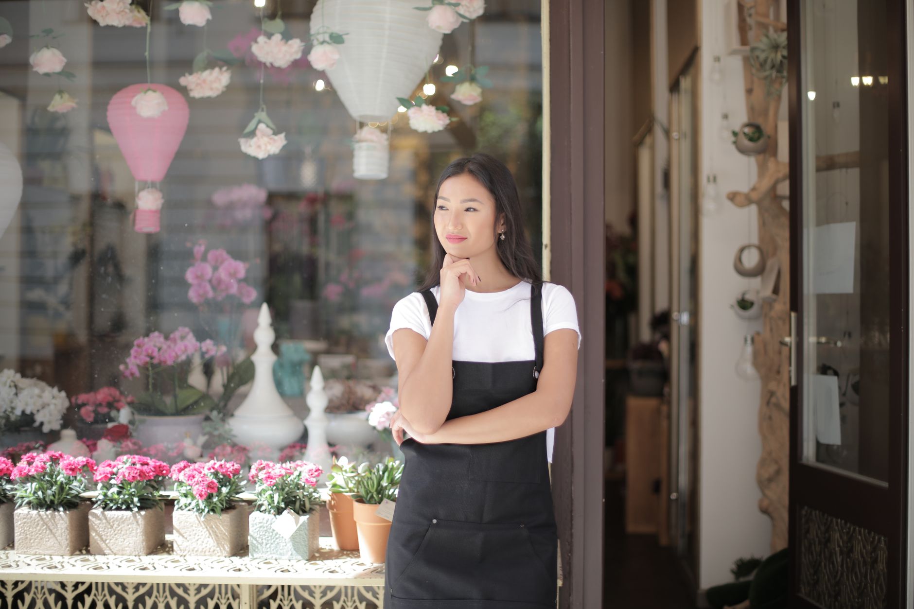 A shopkeeper giving their storefront a recognisable look