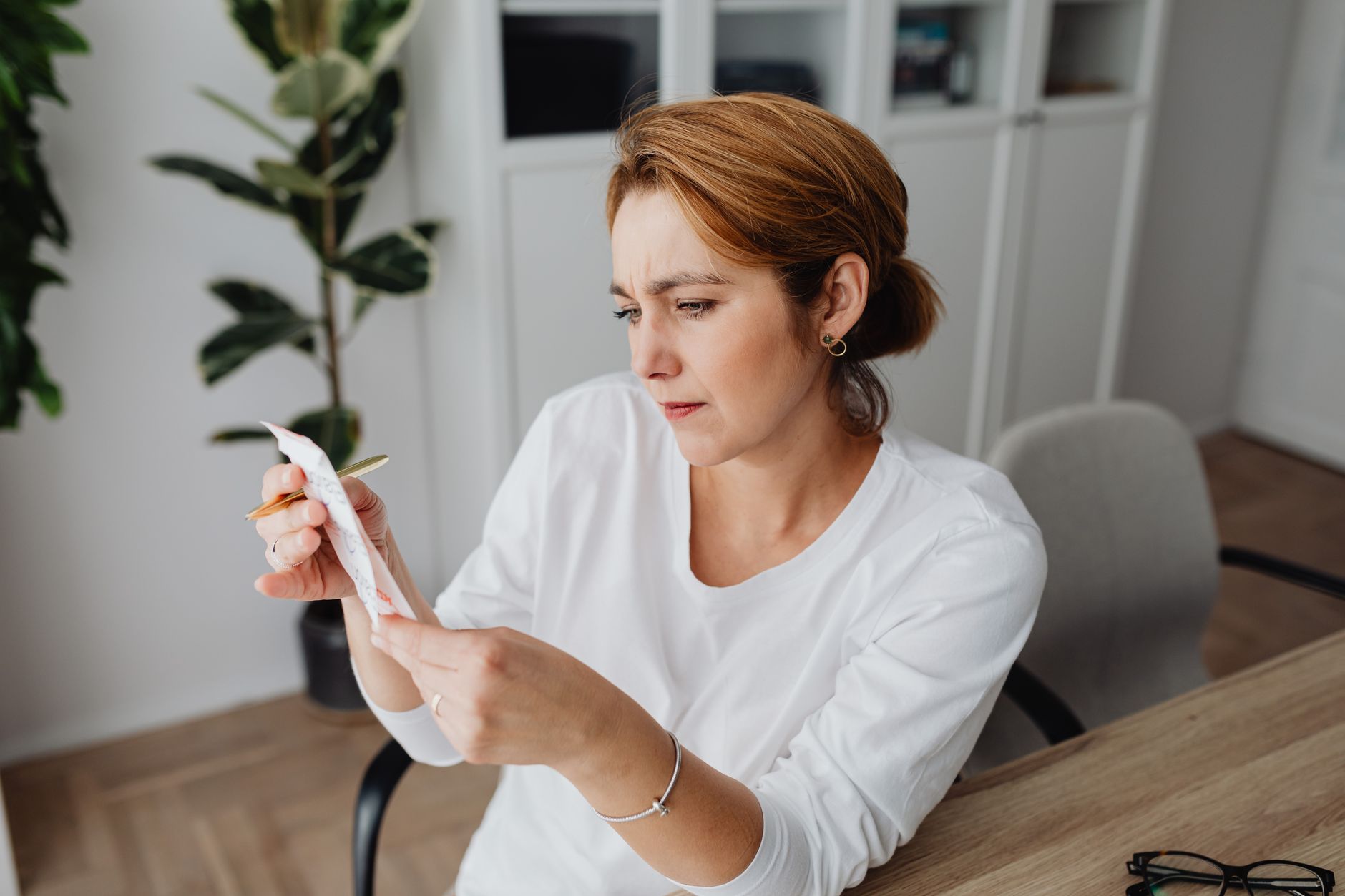 A founder checking the day's takings with visible worry
