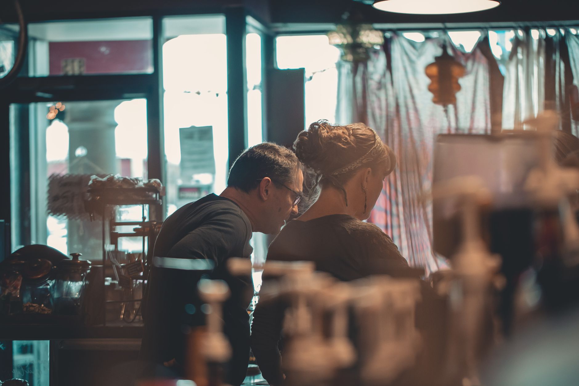 Two business owners weighing up how to split their marketing effort