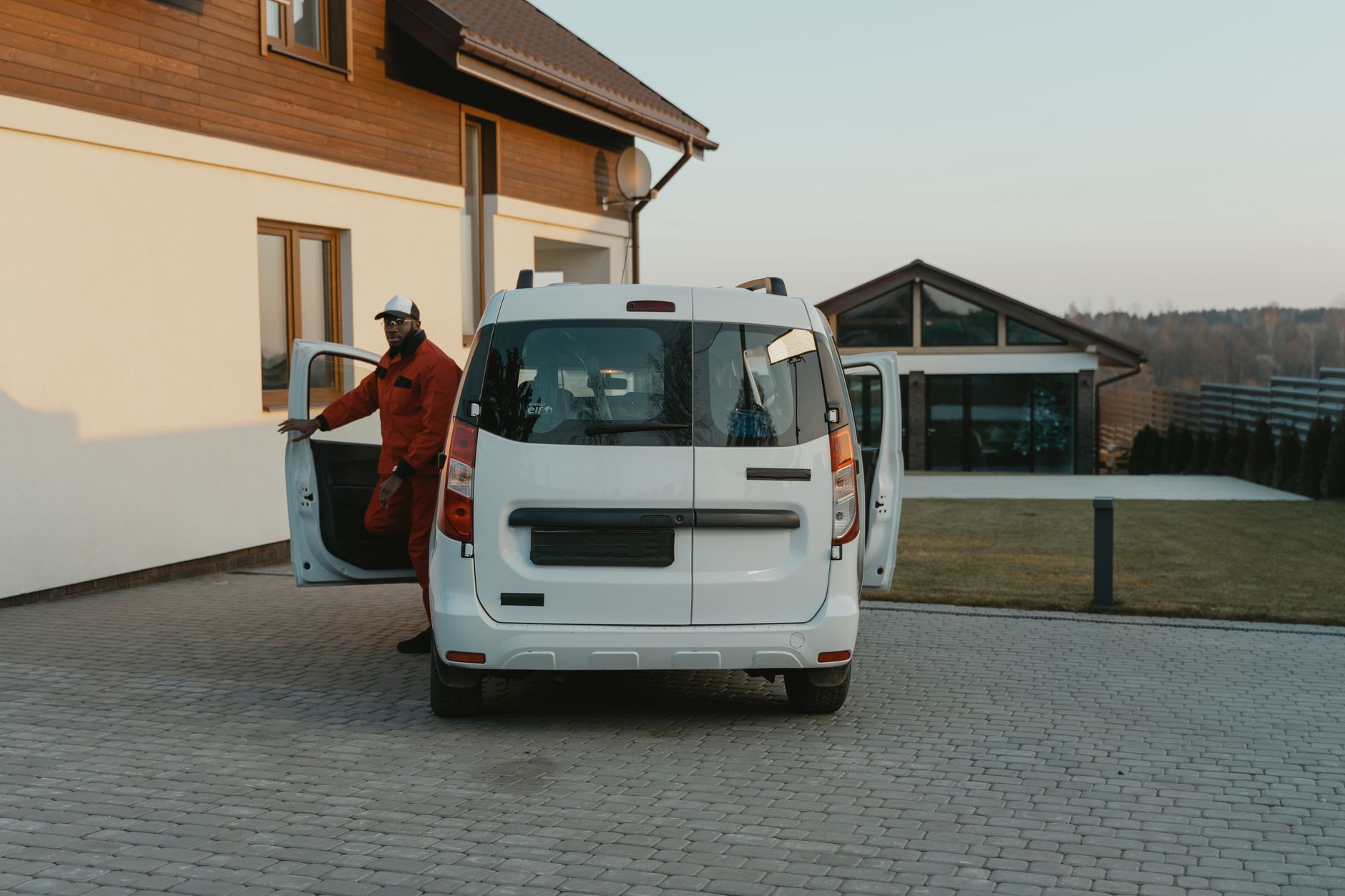 A window cleaner arriving for a regular, familiar appointment