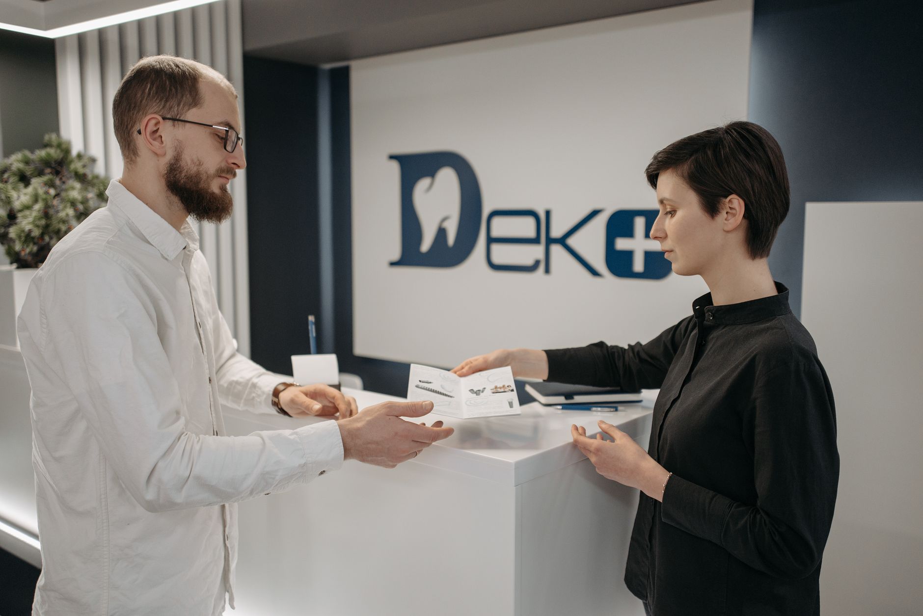A practitioner speaking with a returning, loyal client