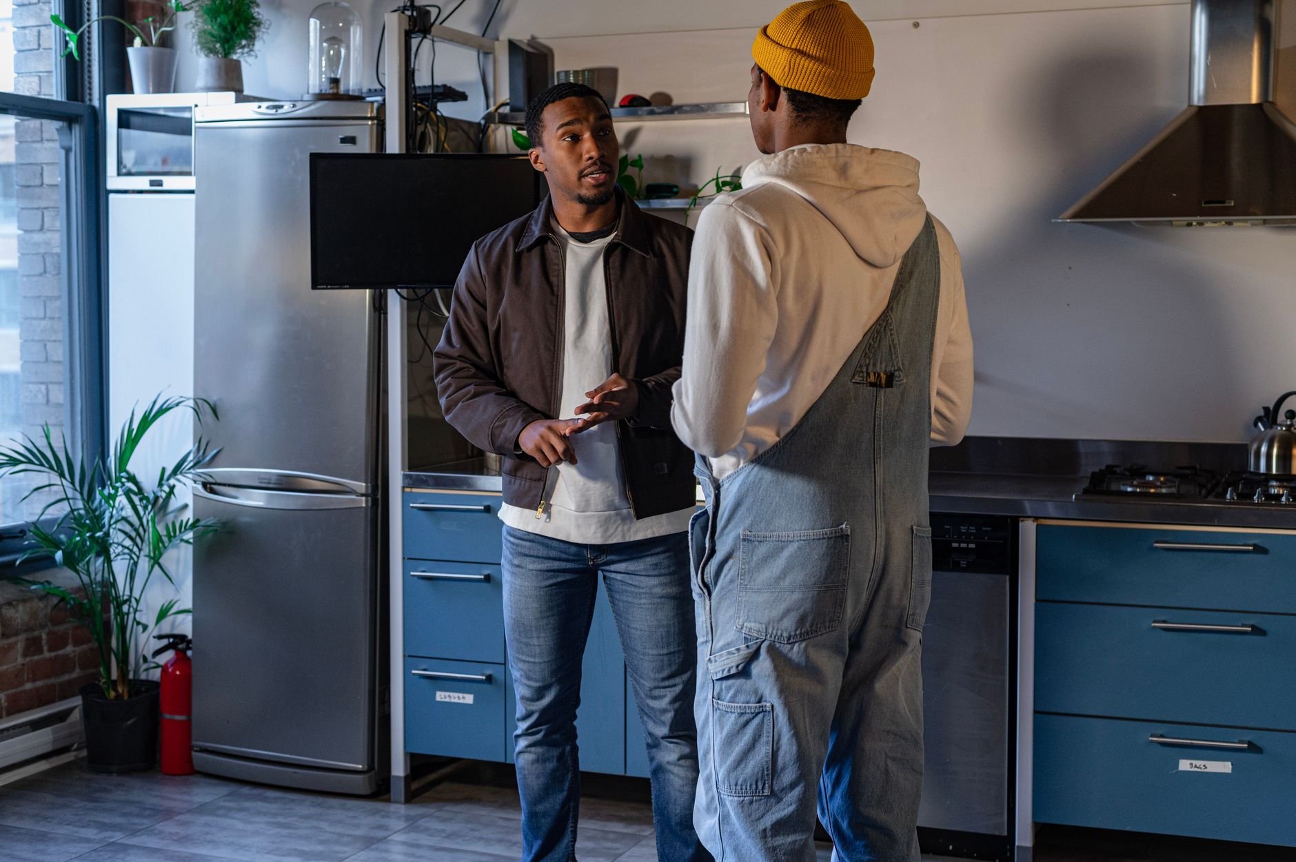 A kitchen fitter giving a customer an honest, direct opinion